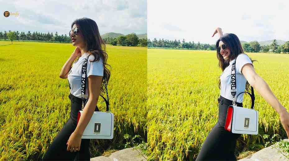 Srileela posing cutely in the green fields
